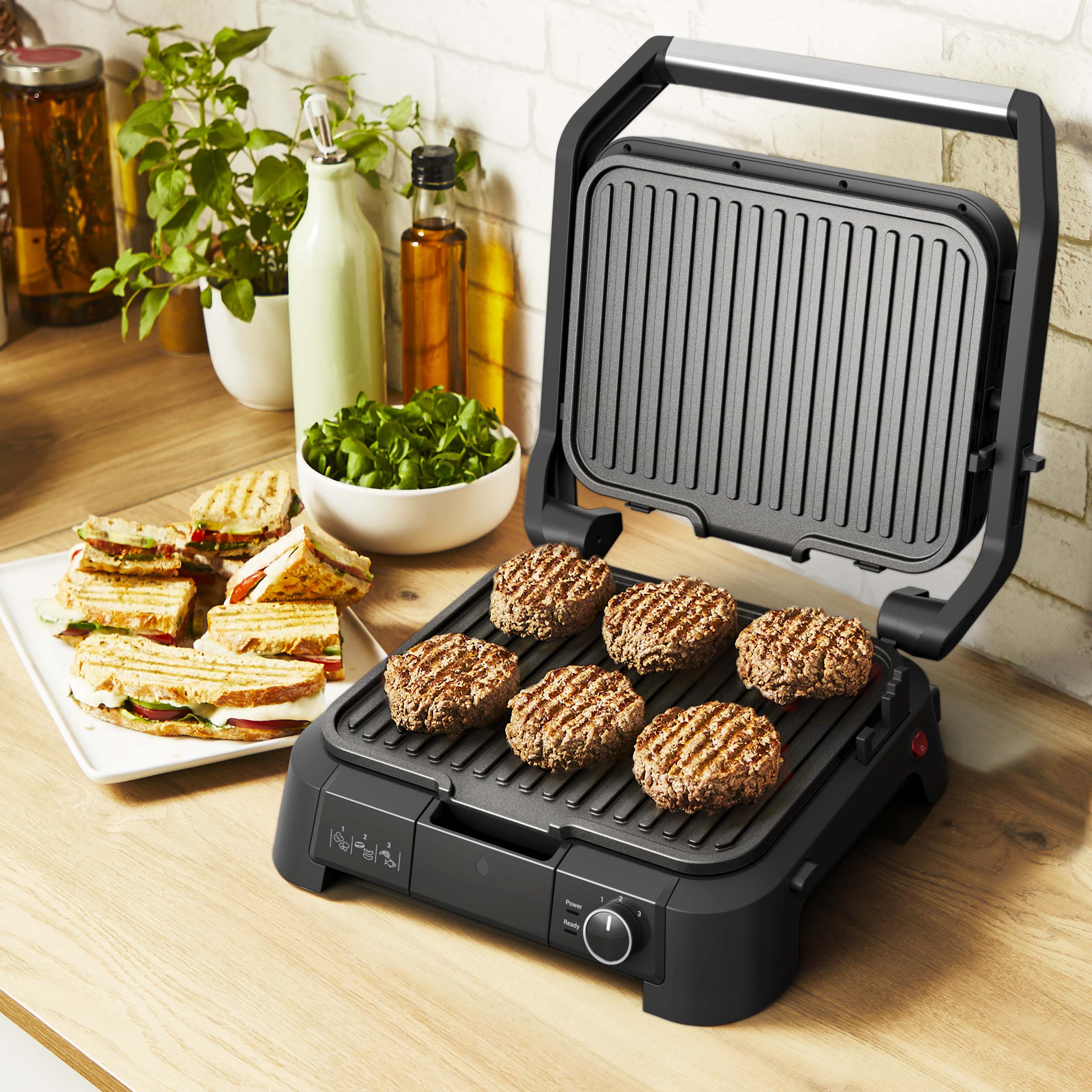 Supergrill 3-in-1 - Takket være en funktion til åbning af grillen 180° kan du forvandle din SuperGrill til en traditionel grill 