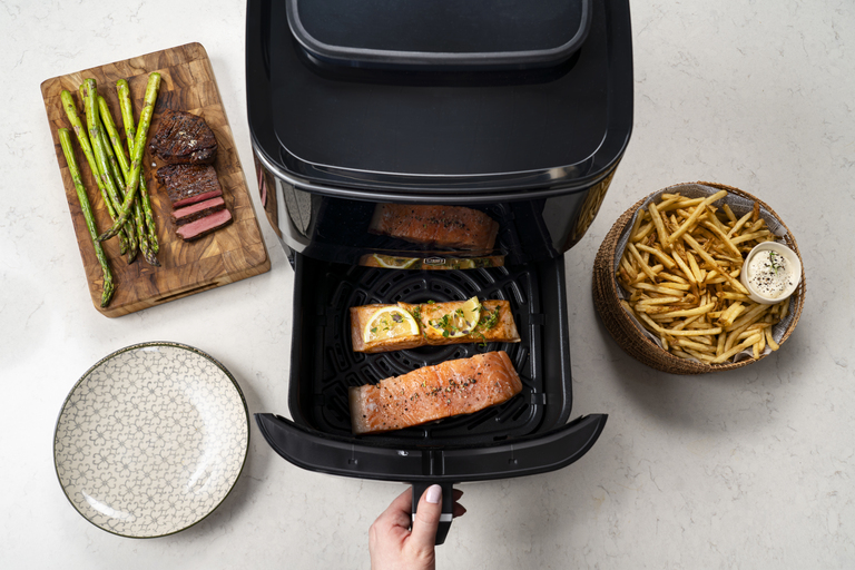 99 % mindre fedt*. 49 % hurtigere end tilberedning i ovn**